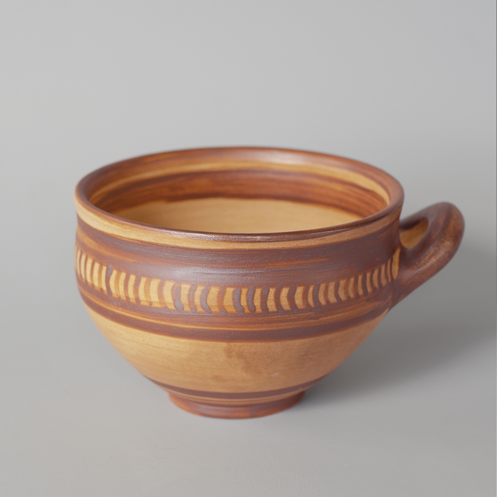 Left: reconstruction of a Mycenaean cup. Right: original  from the Virginia Museum of Fine Arts, 13th century B.C.