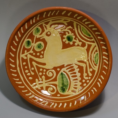 17th century dish  with stag and replica to the left