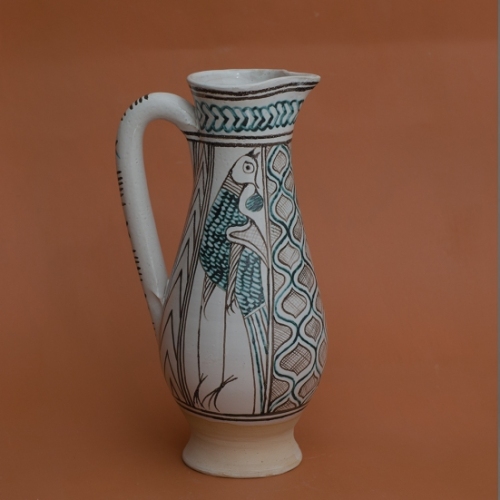 left: replica. right: pitcher made in orvieto-or-sienna-1385-1400-Louvre Museum