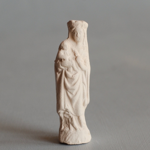 replica of a pipeclay Mary with child