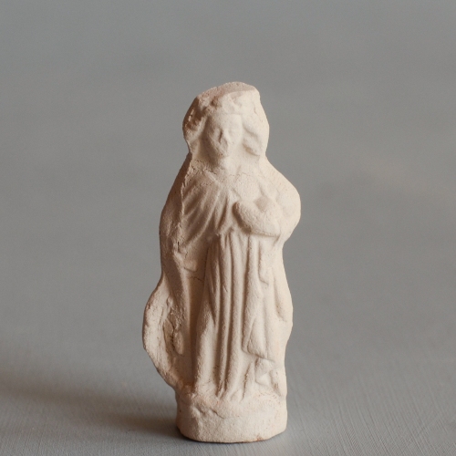 replica of a pipeclay St Catherine